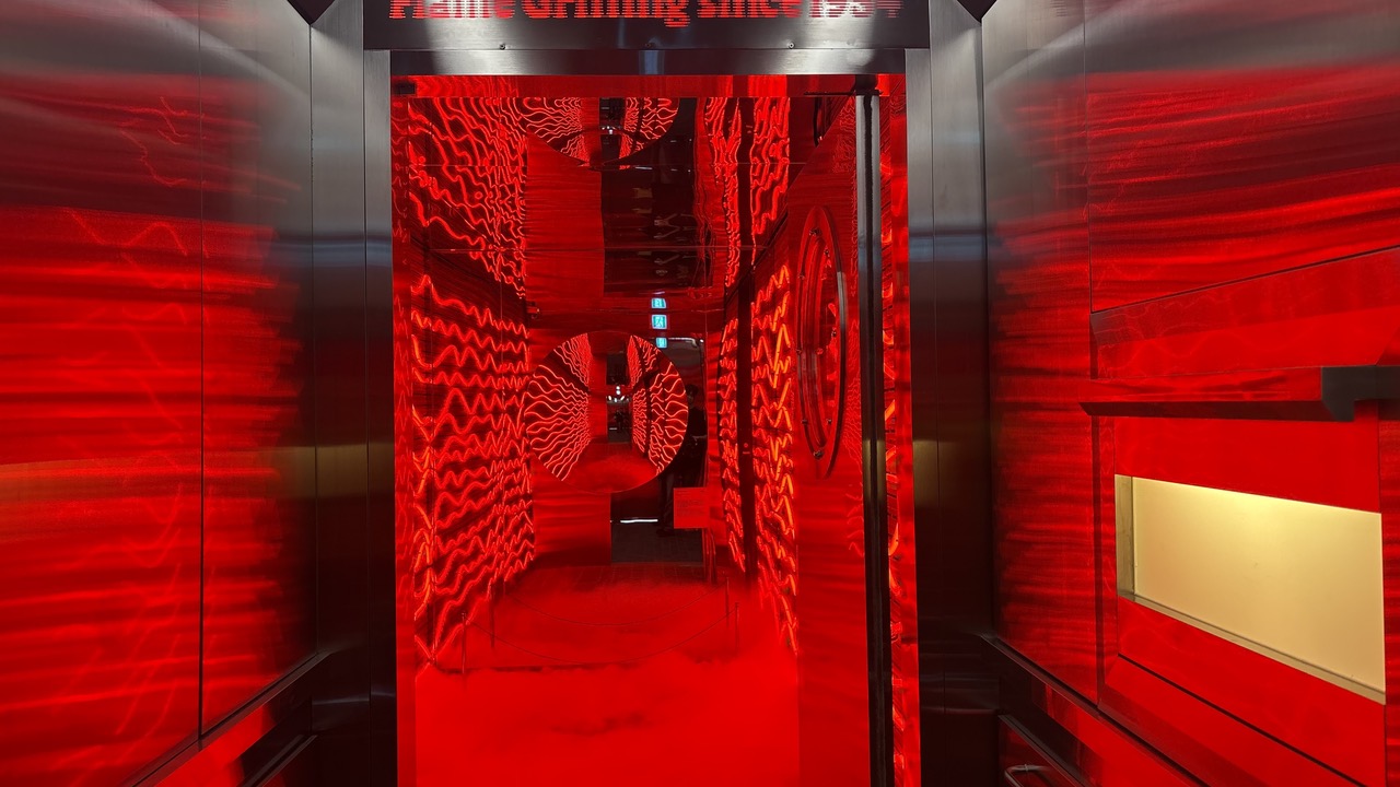 The way in · You pass through this corridor before you reach the hall. Smoke settles around your feet. ©Herald Business