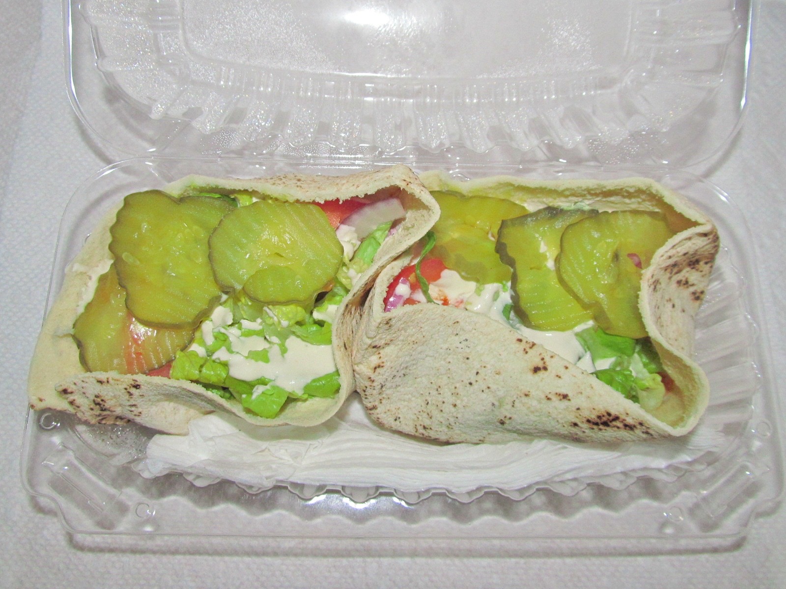 Falafel pita sandwich · Middle Eastern street food, and what Accad's first shop sold. The photo is from another shop. ⓒWillis Lam · Wikimedia Commons (CC BY-SA 2.0)