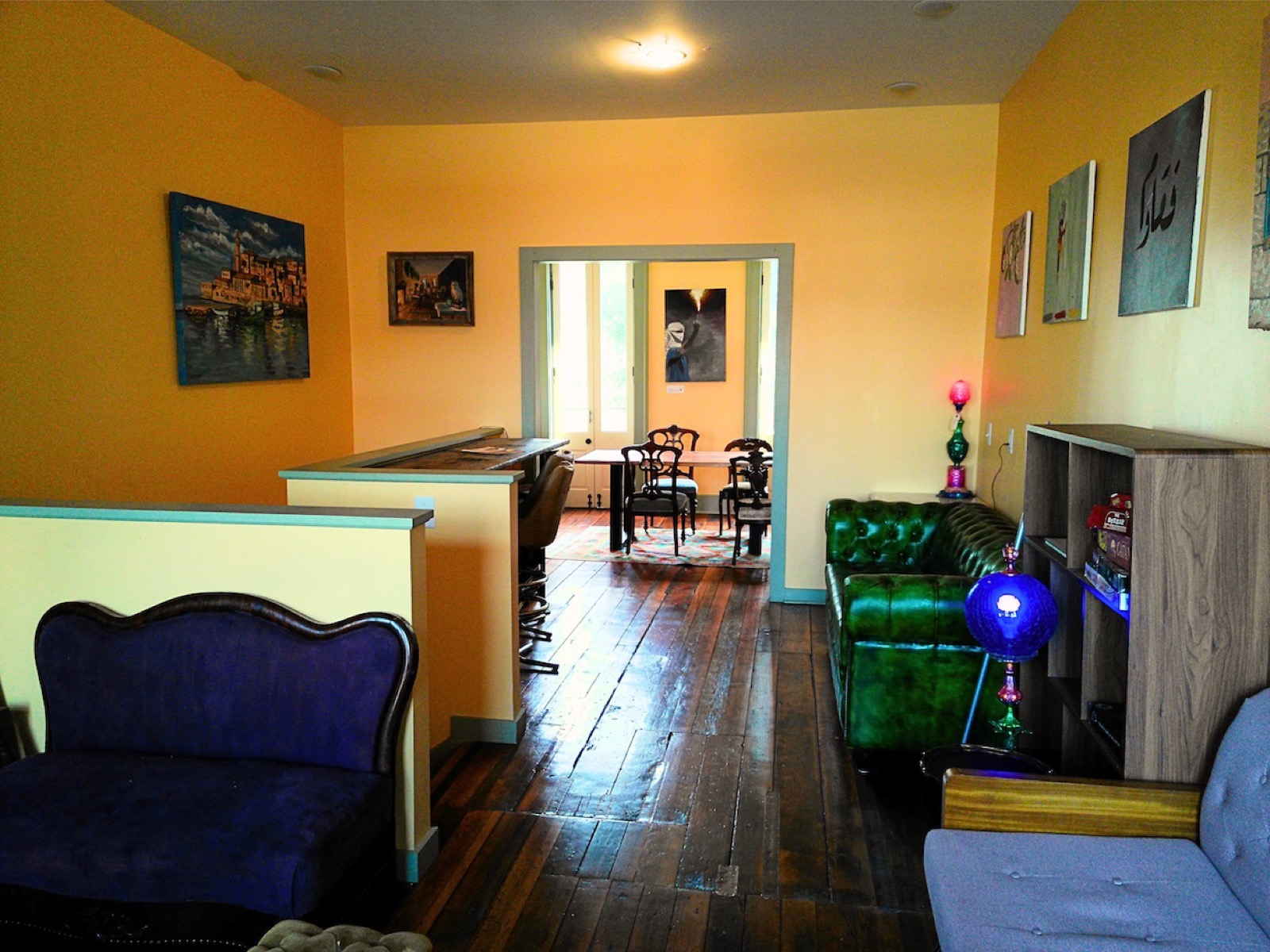 The seats come first · The counter sits behind a partition and the sofas face the door. ©Radical Bean Cooperative