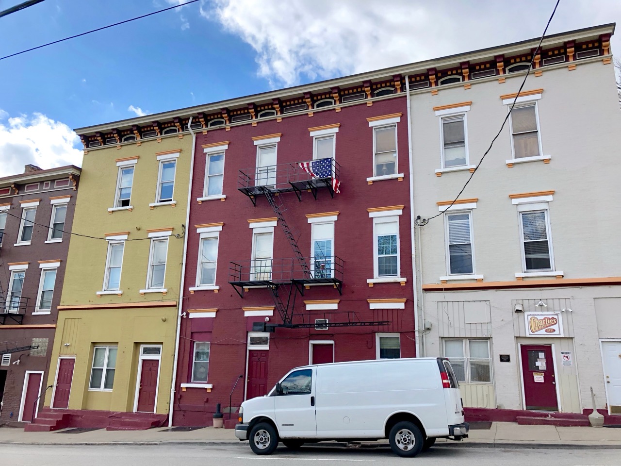 The restored side · Rowhouses on Vine Street. Facades like these are what $1.7 billion bought. ©Warren LeMay · Wikimedia Commons (CC0)