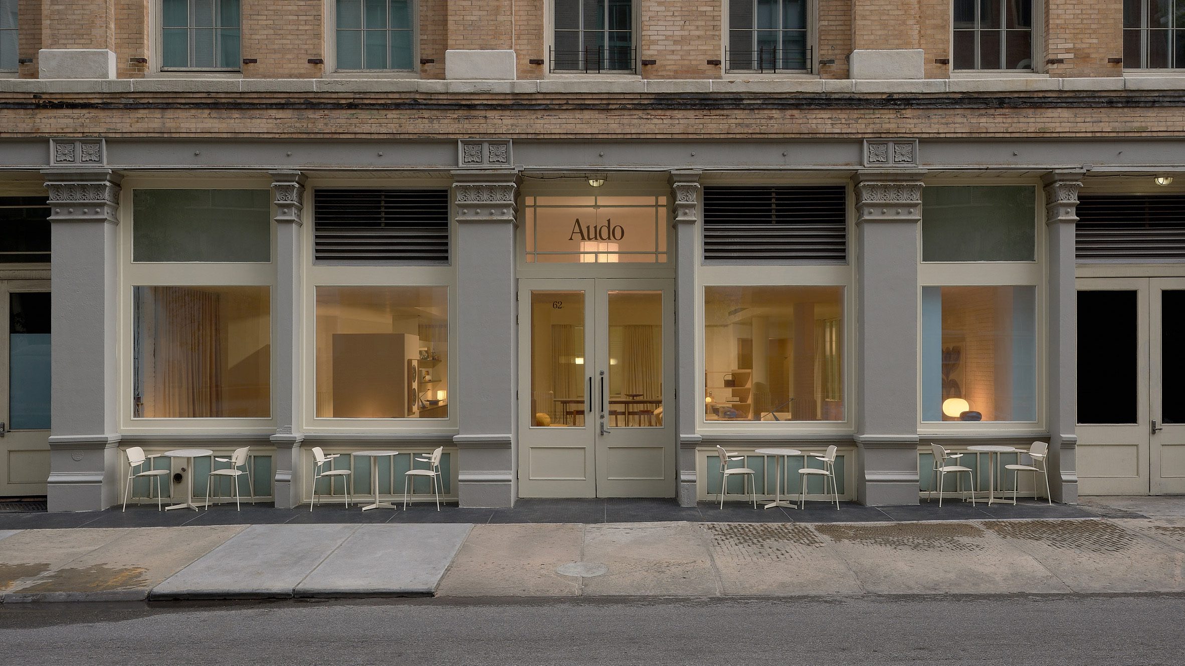 Number 62 · Four shopfront windows, four tables on the sidewalk. ⓒAudo Copenhagen / Norm Architects