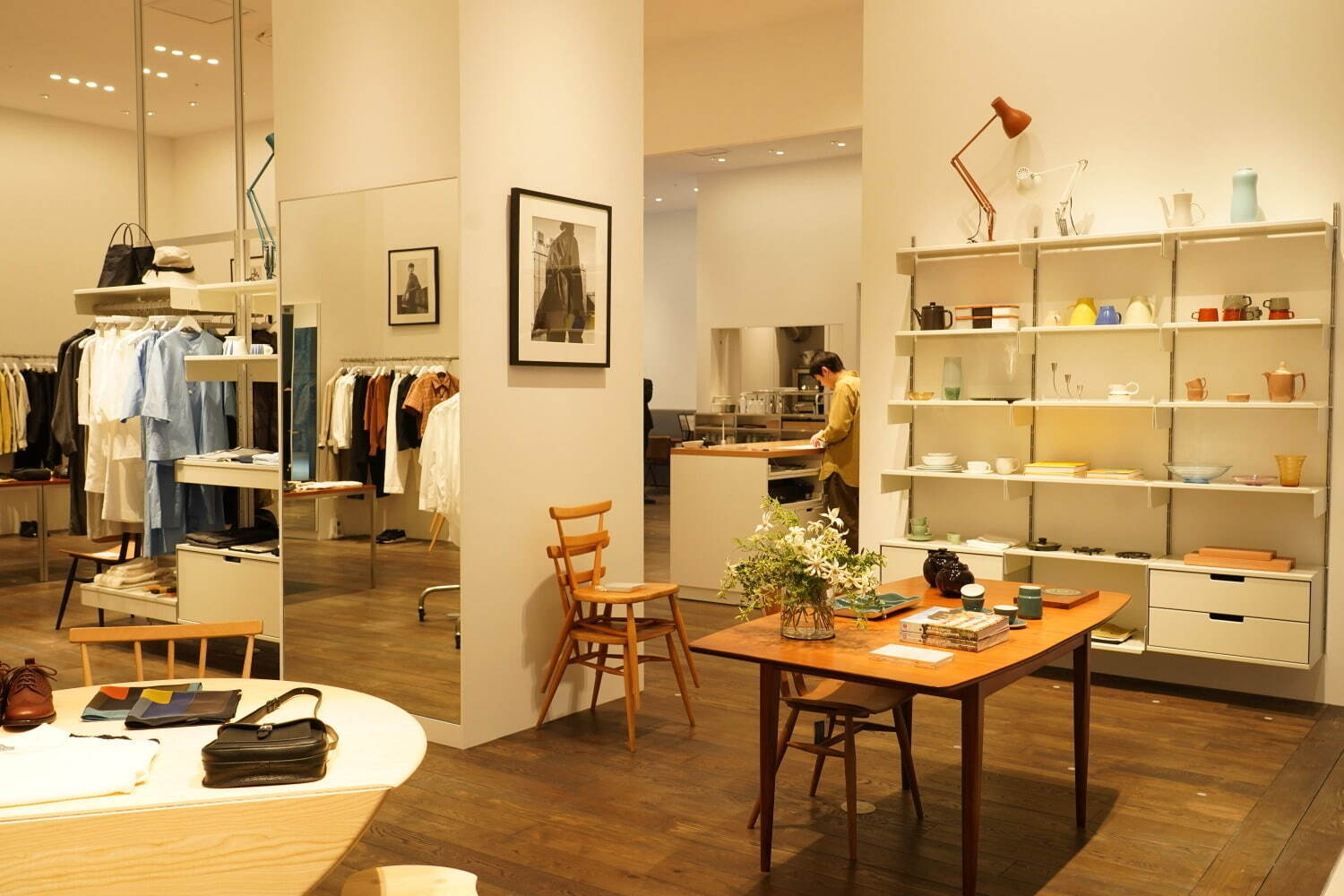 Inside the Osaka store · Tableware, a table and a lamp take up as much space as the clothing rails. ⓒFASHION PRESS