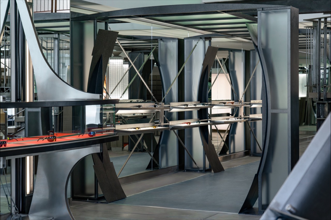 Shelves in round frames · Display cases cut from metal panels with round openings. ⓒBlue Elephant·retaildesignblog