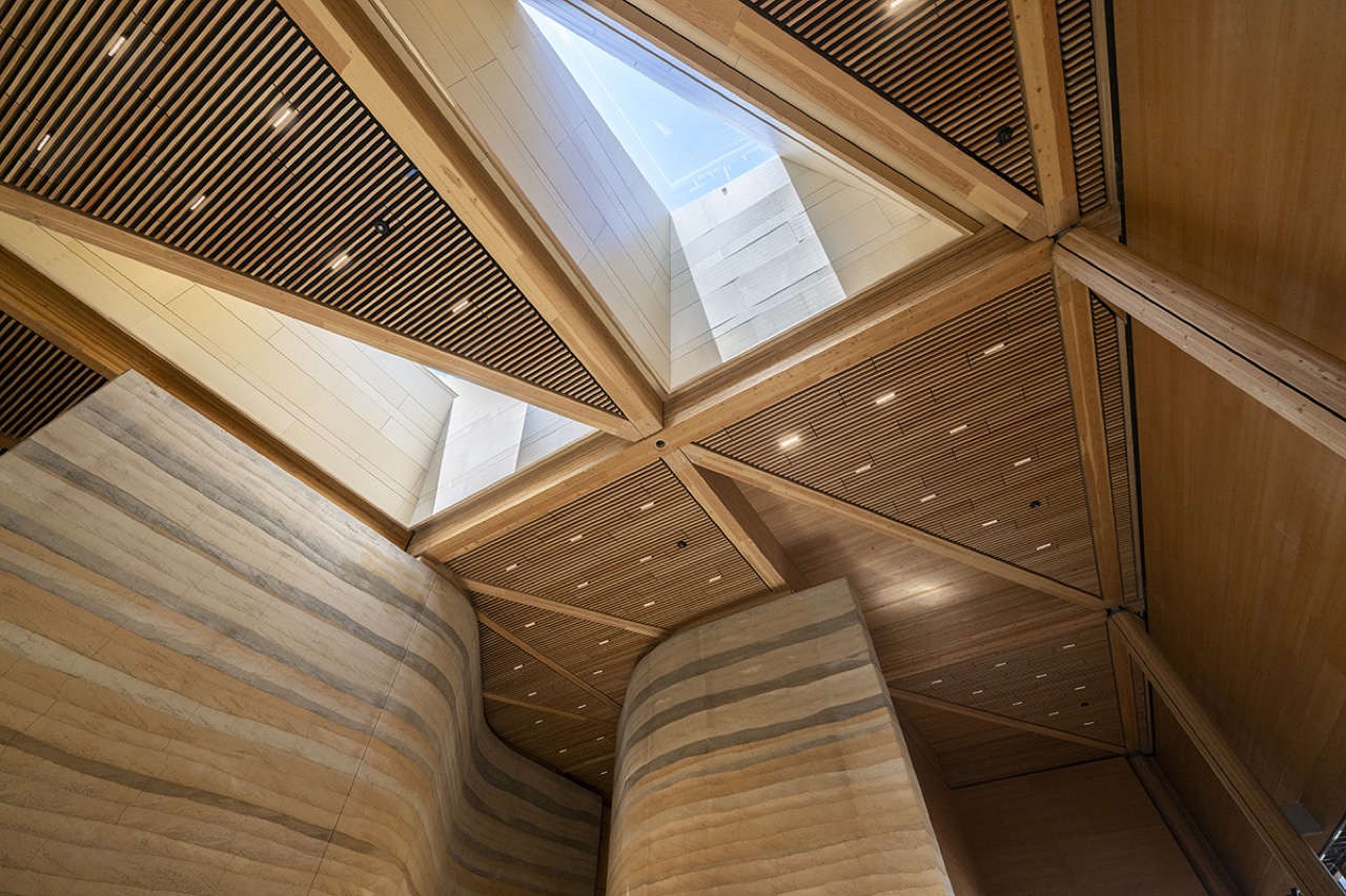 Earth wall and skylight · Triple glazed skylights set into the timber roof. ⓒNew Atlas