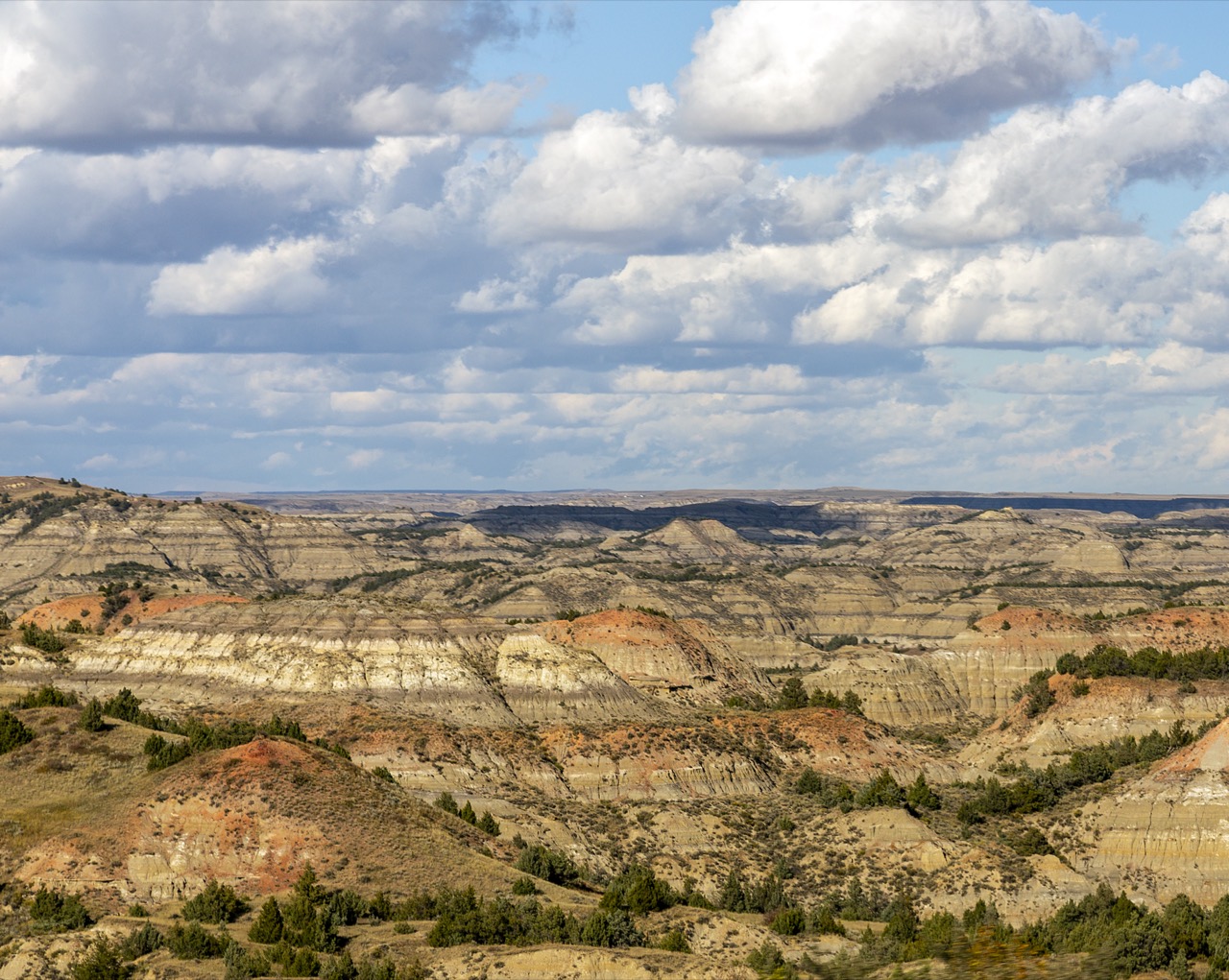 The Badlands · The color bands in the earth walls came from here. ⓒWikimedia Commons